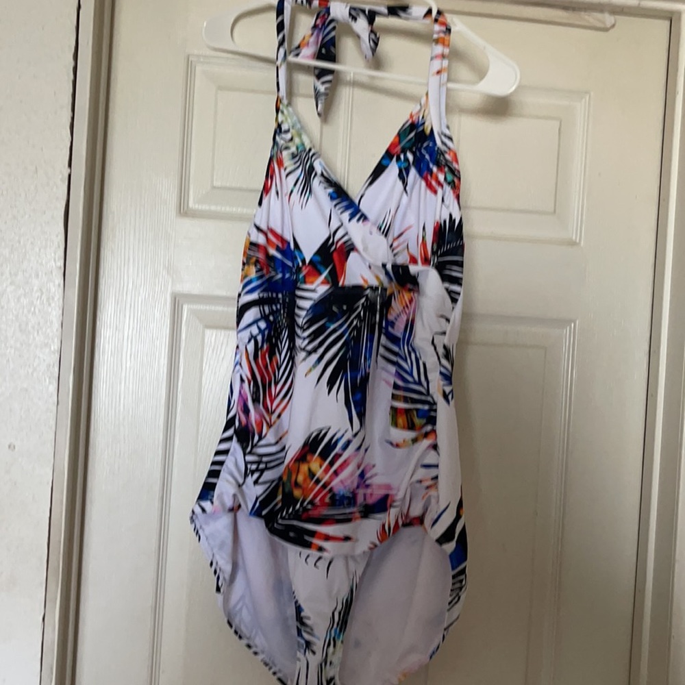 Brand new beautiful bathing suit. I took tags off but didn’t use it.